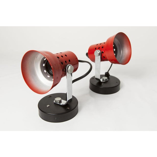 Pair of red and black wall sconces from the 1970s. They are in very good condition and clean. Up to 250V (Europe/UK...