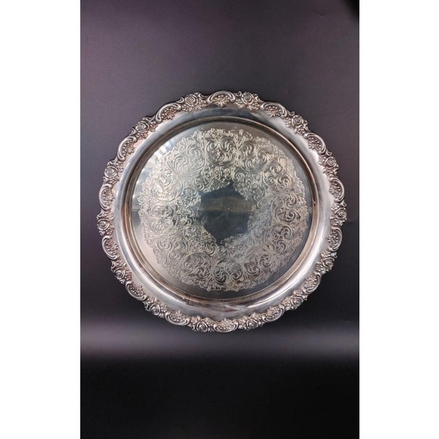 Vintage Wm A Rogers Holloware Silver Plate Serving Tray by Oneida. Features a Raised Rose and Ornate Design around the rim...