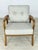 Armchair in a modern retro design with a solid frame made of fine chestnut wood and light, comfortable upholstered...