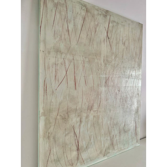 This large abstract painting in cold grey and terracotta tones brings calmness and balance to any modern interior....