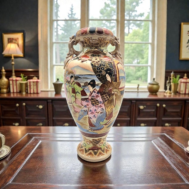 A large hand-painted Japanese export vase produced during the Taishō to early Shōwa period (circa 1910–1935), executed in...
