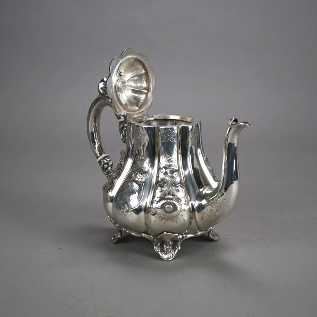 Three Piece Antique Silver Plated Tea Set in Melon Form with Foliate Engraving C1890 Measures - 8.25"H x 9.5"W x 5"D...