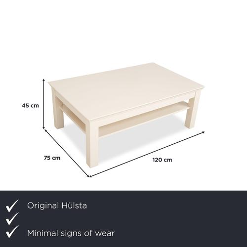Here you'll find a coffee table from Hülsta that impresses with its calm and understated aesthetic. The cream-beige design...