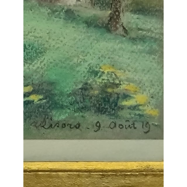 Pair of early 20th century pastels on paper of a cottage and a rural landscape. The works are signed but as yet...