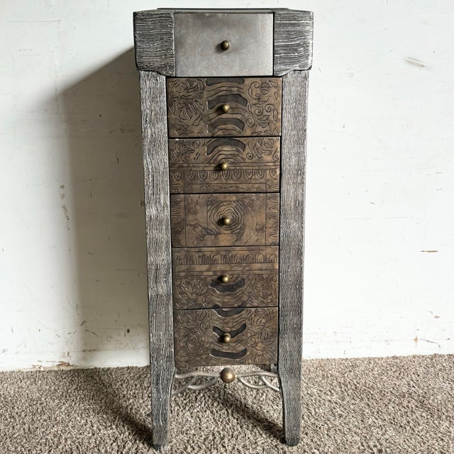 This Postmodern Carved Jewelry Chest/Lingerie Armoire is a unique blend of artistry and function, perfect for adding a...