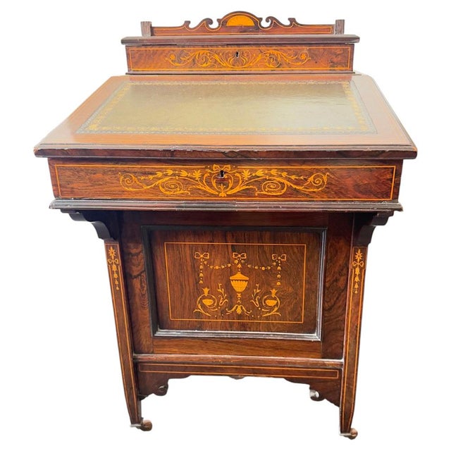 Antique in burl wood inlay fine desk elegant design with practical functionality and a floral decorative appeal, at the...