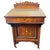 Antique in burl wood inlay fine desk elegant design with practical functionality and a floral decorative appeal, at the...
