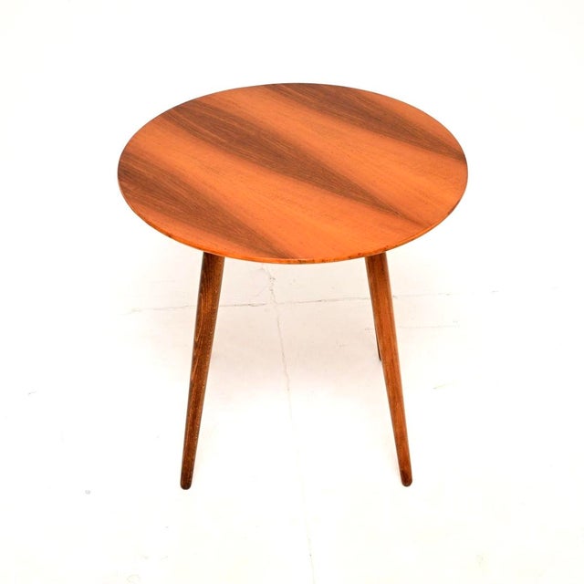 A stylish and very well made vintage figured walnut side table. This was made in England, it dates from around the 1950’s....