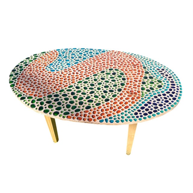 1967 handmade mosaic art table by Jim Price, featuring a vibrant abstract pattern of embedded glass cabochons in swirling...