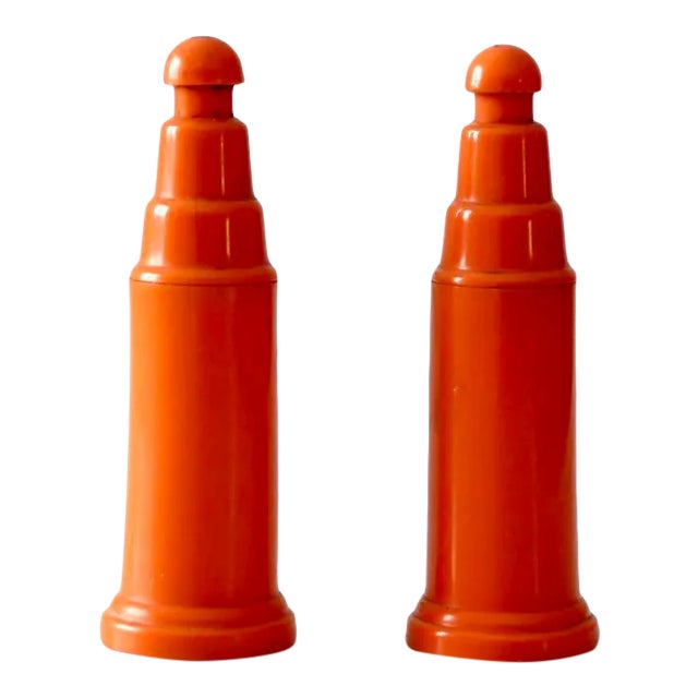 Vintage Push Top Orange Plastic Salt and Pepper Shakers For Sale