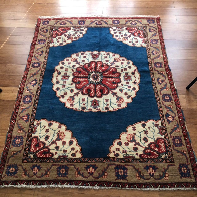 A Vintage Turkish Bridal Rug from Cappadocia with Floral Medallion This exquisite vintage Turkish bridal rug, handwoven in...