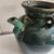 A vintage green glazed vessel. Used in for well water collection. Perfect for flowers
