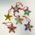 This is a set of 6 hand-painted Christmas Ornaments from Mexico. They are a ceramic clay composition with silk red cords...