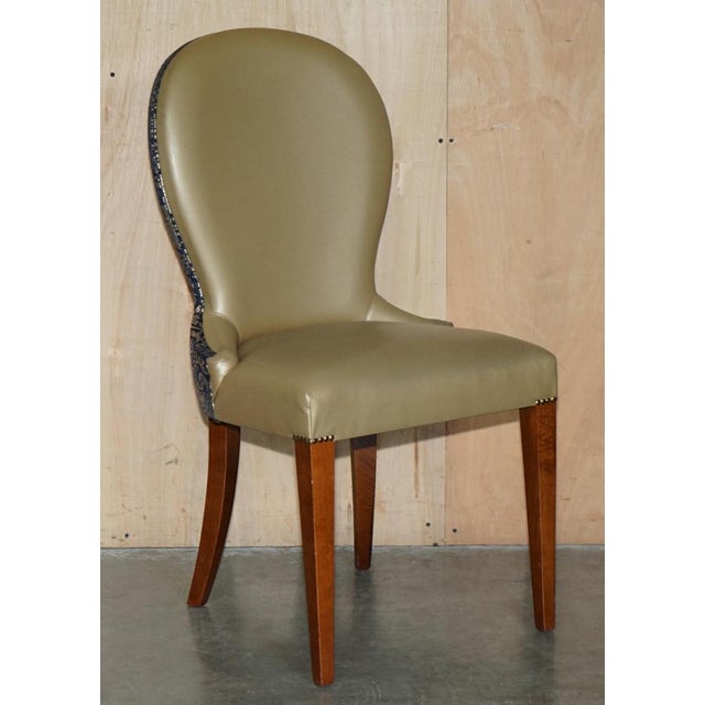 Lovely pair of Contemporary English Elm hall chairs with Damask upholstery to the backs This pair are lovely pieces of...