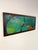 This original abstract acrylic painting captures a lush, layered composition of jewel-toned greens, teals, and blues,...