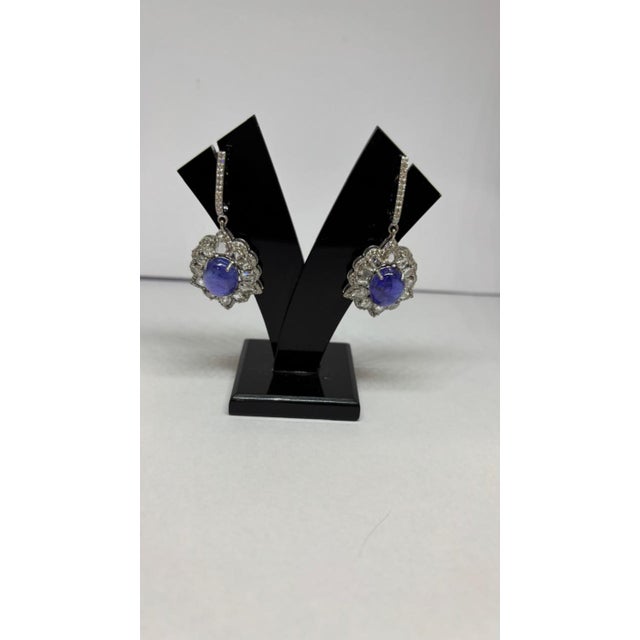 Gemstone details Diamond weight: 3.91 cts Tanzanite weight: 12.30 cts 14K gold Gross weight: 15.14 grams Gold weight:...