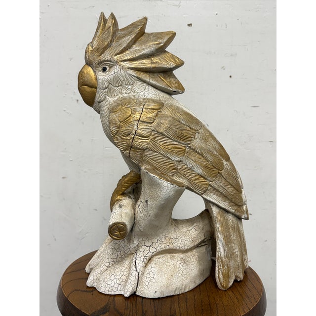 Design Plus Gallery presents a Handmade Carved Wood Cockatoo Sculpture. This decorative cockatoo sculpture is carved in...