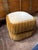 Textural ruching wraps around a segmented silhouette that's fully upholstered in two-tone velvet. Perched on an oak base,...
