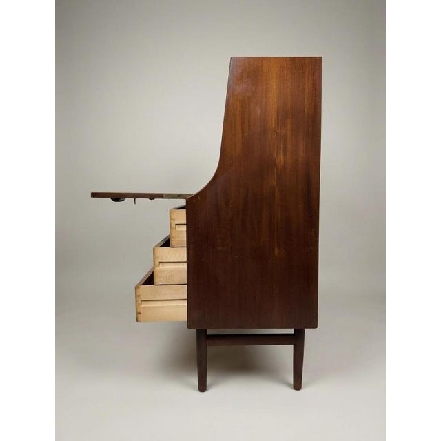 Designed in 1952 and produced by the prestigious Søborg Møbelfabrik, this early Model 145 bureau is a masterful example of...