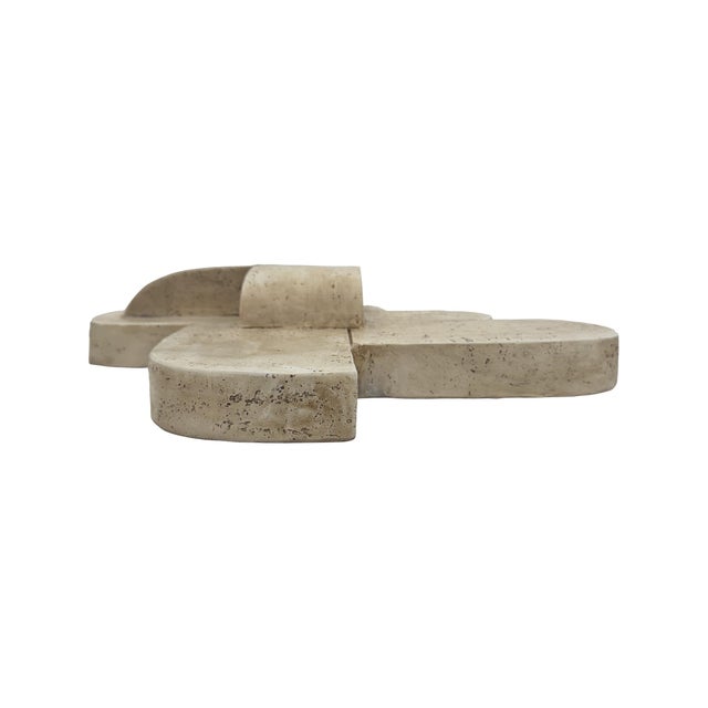 This abstract wall art piece brings depth and dimension to your d?cor. Crafted in a warm stone-inspired finish, its...