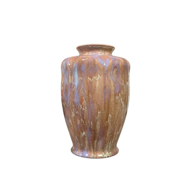 A beautifully glazed art pottery vase from pilkington’s royal lancastrian, shape number 2090a. this piece features a rich,...