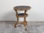 An Italian giltwood side table from the early 20th century, with slate top, shelf and cabriole legs. Created in Italy...