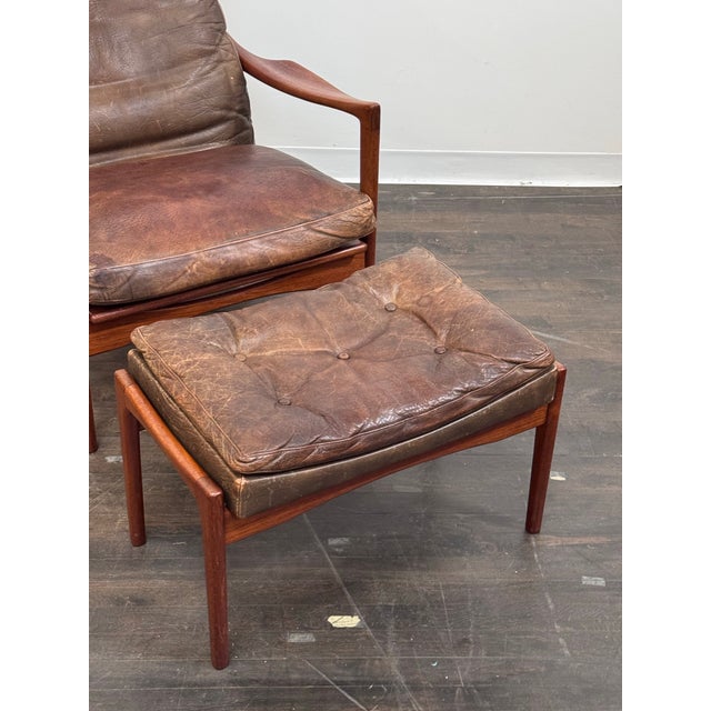 Design Plus Gallery presents a Mid 20th Century Lounge Chair + Ottoman by renowned Danish architect and designer Ib Kofod-...