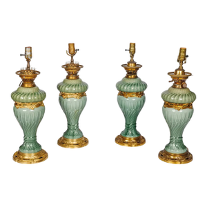 A Suite of Four Theodore Deck Ormolu-Mounted Celadon Green Porcelain Lamps