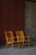 A pair of iconic "Eva" lounge chairs designed by Bruno Mathsson and produced by Karl Mathsson, Sweden. First introduced in...