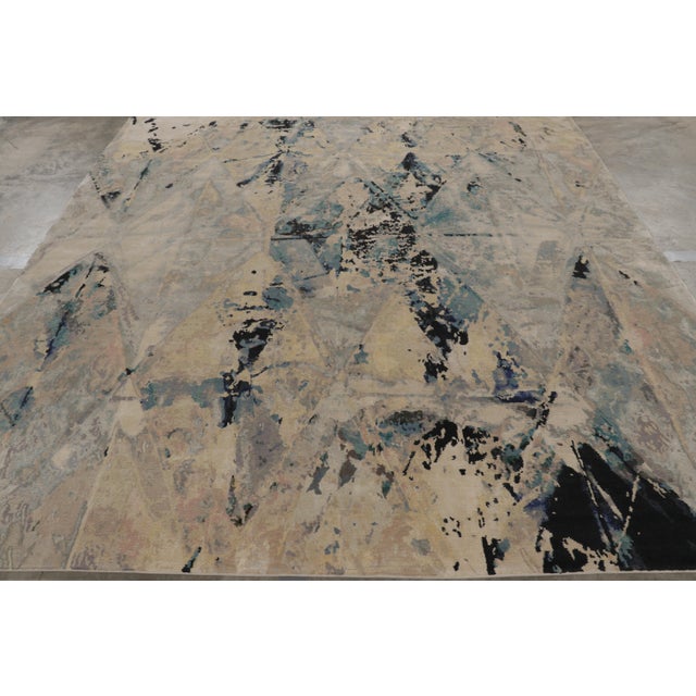 Hand-knotted in a luxurious blend of wool and silk, this 8x10 abstract rug is a bold and exciting new addition to Rug &...