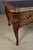 Large walnut desk with pull-out slides and five drawers in the front. This desk was made by the potheau constantin firm in...