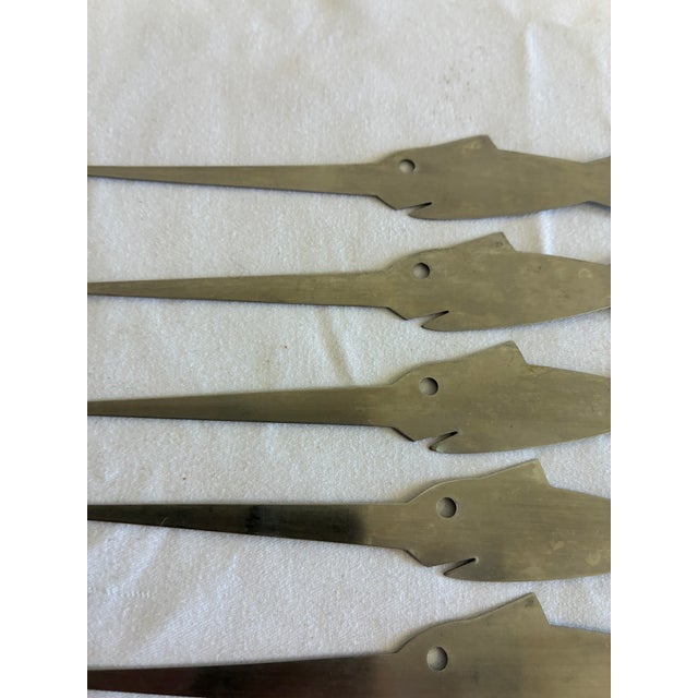 A delightful set of 8 vintage finds cocktail skewers, each cut from silver-toned metal (aluminum or steel) and shaped like...