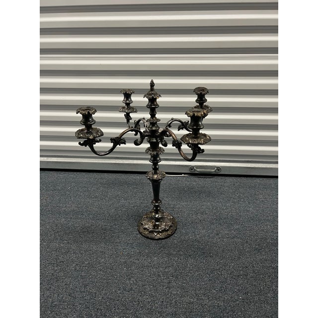 This pair of vintage 4-arm (multi-branched ) Candelabras are originally from Belgium . You can see that they show the...