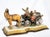 An antique Capodimonte sculpture depicting a horse-drawn carriage, signed "Bruno Marli", dating from the 20th century. The...