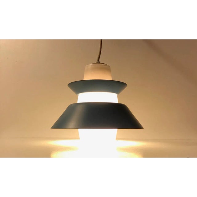 Ceiling light from Voss Belysning i Denmark. Manufactured during the 1950s in a style reminiscent of Stilnovo and Holm-...