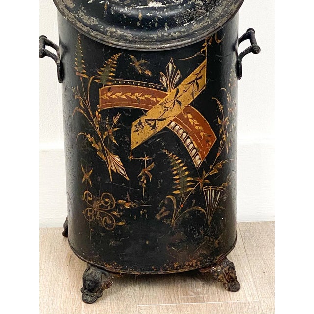 A late 19th Century English painted tole coal scuttle, circa 1880.