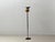 A rare mid-century design floor lamp by the swiss manufacturer bag turgi from the 1950s. The lamp is characterized by its...