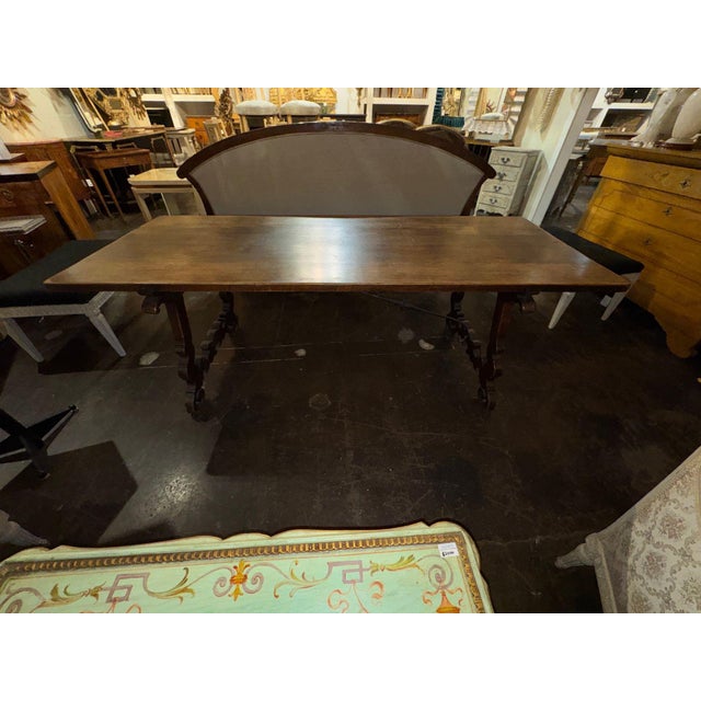 This 19th c. Spanish Walnut Trestle Table is a versatile and stylish piece of furniture. Made from high-quality Spanish...