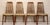 This is set of four teak and tweed dining chairs. The chairs are a classic slat back design allowing them to be both...