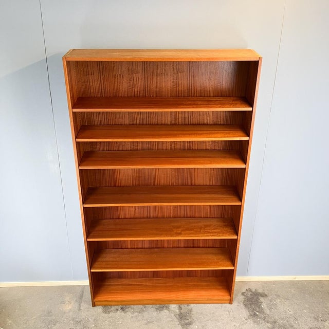 A classic, simple bookshelf made in Germany with beautiful details such as the continuous perforated rails. This allows...