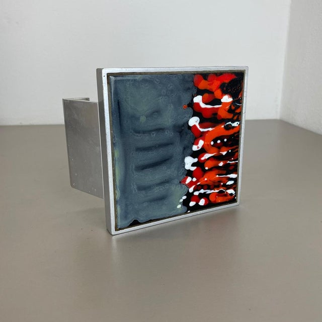 Article: Door push element Origin: Belgium Design producer: Juliette Belarti Material: metal and ceramics Decade: 1970s :...