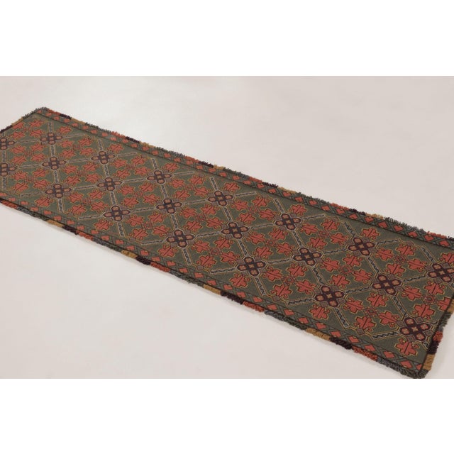This 2x6 antique Swedish tapestry is a handwoven wool and cotton piece dating to circa 1900. Originating from Sweden, the...