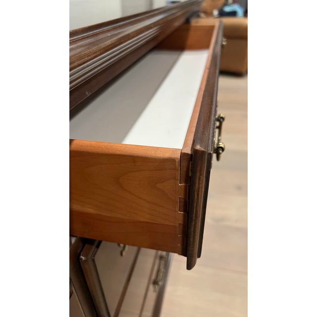 Beautiful Ethan Allen 10-drawer triple dresser in excellent condition. Made in the USA in 1991, this piece reflects the...