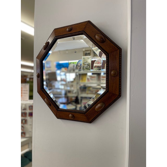 This finely crafted antique octagonal wall mirror features a solid quarter-sawn oak frame with a rich medium-brown finish,...