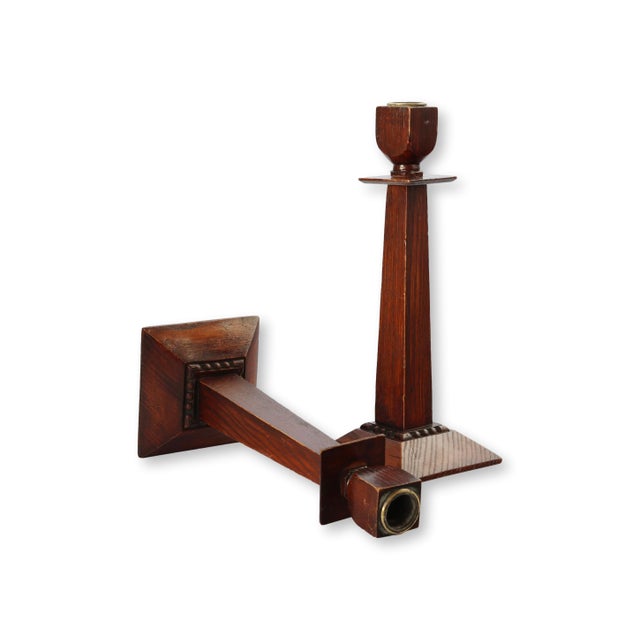 This pair of Arts and Crafts tiger oak candlesticks made of stunning tiger grain oak that highlights the natural beauty...