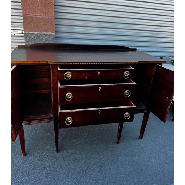 Beautiful older buffet/sideboard by Northern Furniture Company of Sheboygan, Wisconsin, with the maker’s stamp inside the...