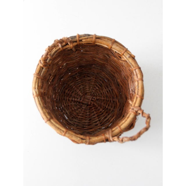Vintage Handwoven Wicker Basket With Twisted Handles For Sale - Image 4 of 11