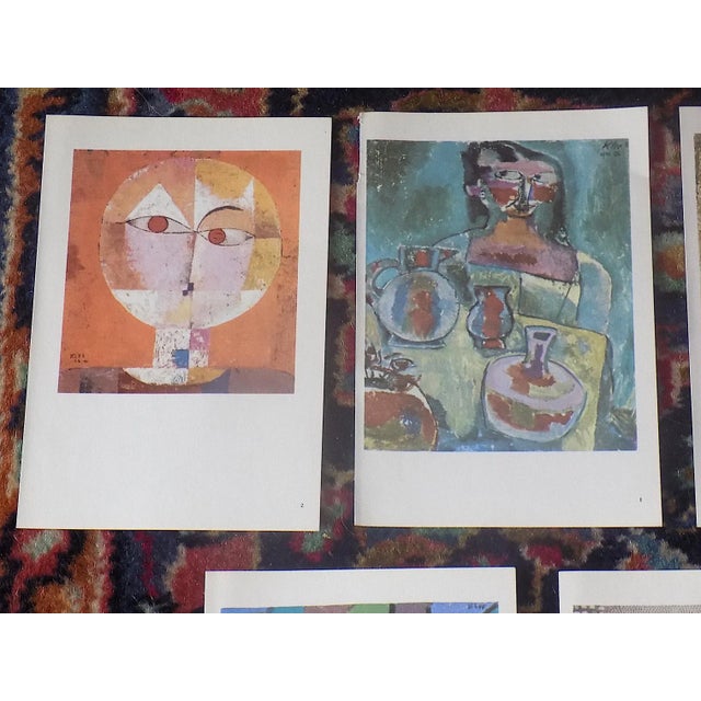 This set of fifteen (15) lithographs (offset) depict abstract masks and figures created by the modernist master Paul Klee...