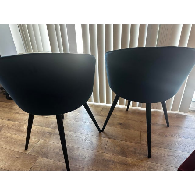 Beautiful pair of authentic Room & Board Sylvan Swivel Side Chairs upholstered in a rich blue velvet. The Sylvan's clean,...
