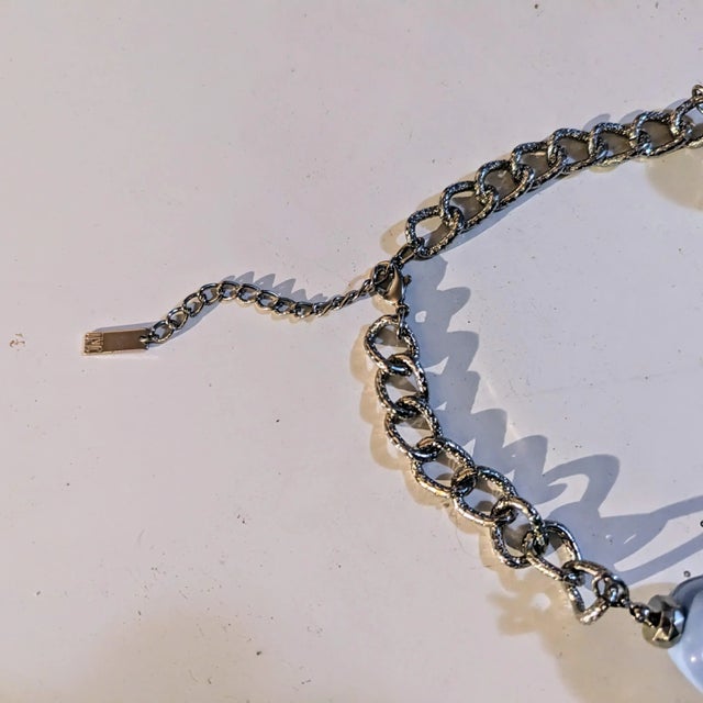 Chunky necklace in acrylic in early 2000. The silver plated chain is in mint condition along with the acrylic nuggets in...